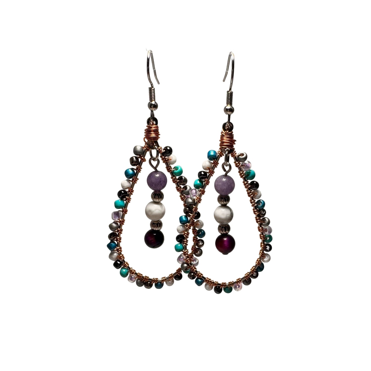 Handmade Celestial Tears Earrings with wire-wrapped, teardrop-shaped frame supporting LGBTQ+ communities by Not Just North artisan jewelry
