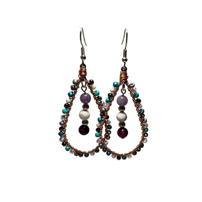 Handmade Celestial Tears Earrings with wire-wrapped, teardrop-shaped frame supporting LGBTQ+ communities by Not Just North artisan jewelry