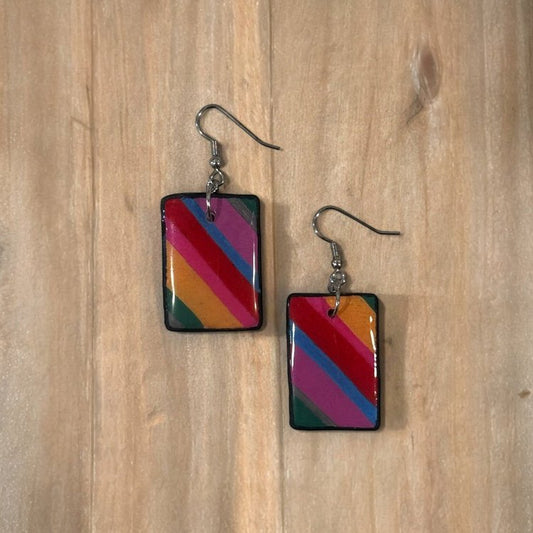 Rectangle with diagonal stripes in red, blue, and pink