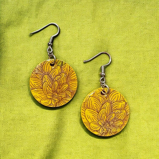 golden yellow flower earrings coated in resin